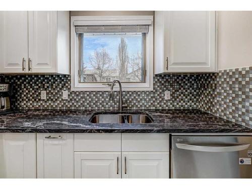64 Valley Meadow Close Nw, Calgary, AB - Indoor Photo Showing Kitchen With Double Sink