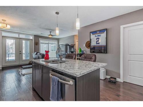 206-15207 1 Street Se, Calgary, AB - Indoor Photo Showing Kitchen With Double Sink With Upgraded Kitchen