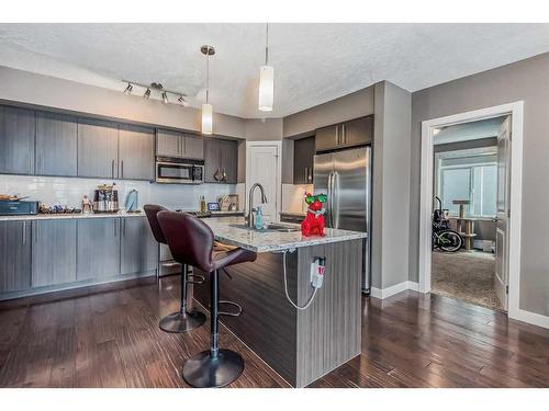 206-15207 1 Street Se, Calgary, AB - Indoor Photo Showing Kitchen With Upgraded Kitchen
