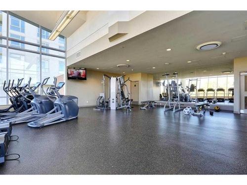 132-99 Spruce Place Sw, Calgary, AB - Indoor Photo Showing Gym Room