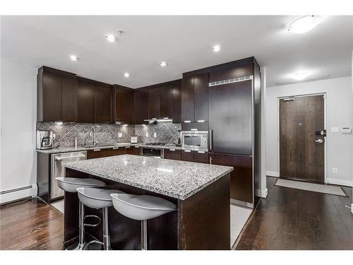 132-99 Spruce Place Sw, Calgary, AB - Indoor Photo Showing Kitchen With Stainless Steel Kitchen With Upgraded Kitchen