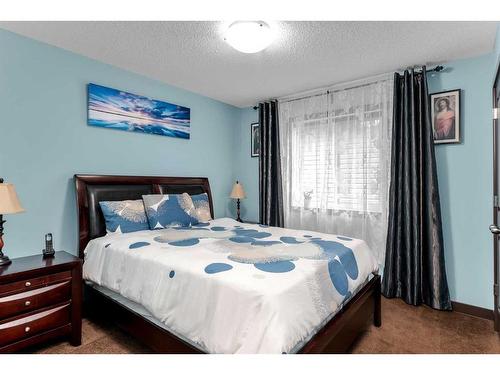 53 Legacy Gate Se, Calgary, AB - Indoor Photo Showing Bedroom