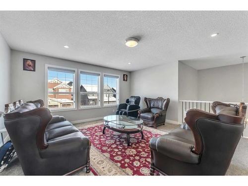 245 Aspenmere Way, Chestermere, AB - Indoor Photo Showing Living Room