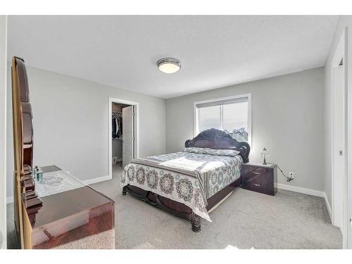 245 Aspenmere Way, Chestermere, AB - Indoor Photo Showing Bedroom