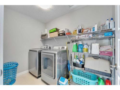 245 Aspenmere Way, Chestermere, AB - Indoor Photo Showing Laundry Room