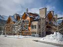 1306-101A Stewart Creek Landing, Canmore, AB  - Outdoor With Facade 
