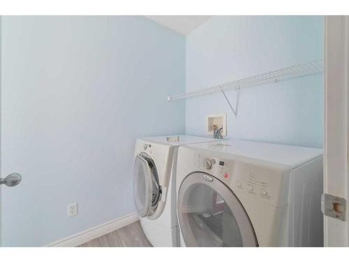 75 Saddlebrook Way Ne, Calgary, AB - Indoor Photo Showing Laundry Room