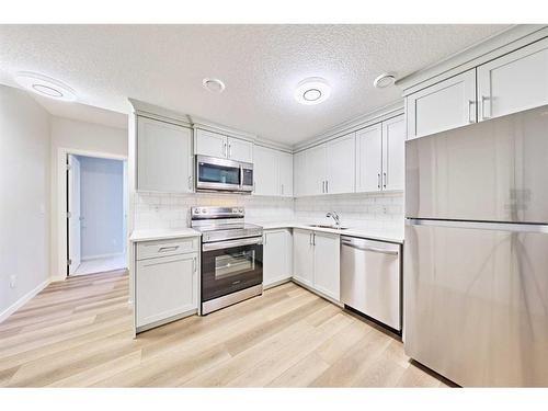 67 Seton Villas Se, Calgary, AB - Indoor Photo Showing Kitchen With Stainless Steel Kitchen