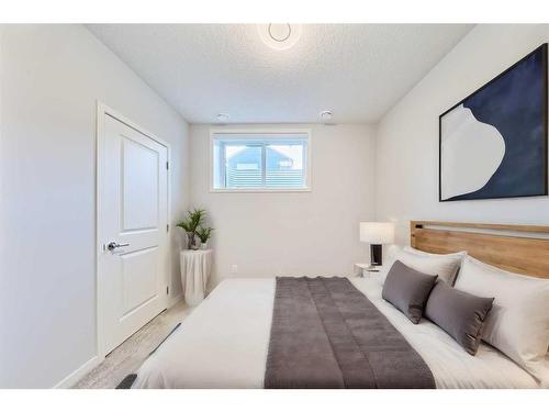67 Seton Villas Se, Calgary, AB - Indoor Photo Showing Bedroom