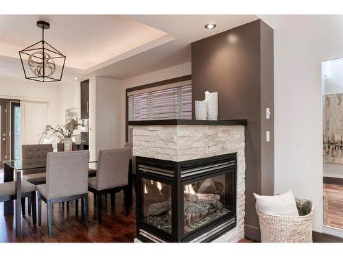 532 23 Avenue Sw, Calgary, AB - Indoor Photo Showing Dining Room With Fireplace