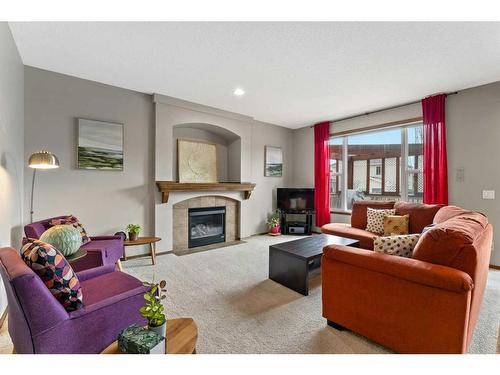 31 Cranfield Link Se, Calgary, AB - Indoor Photo Showing Living Room With Fireplace
