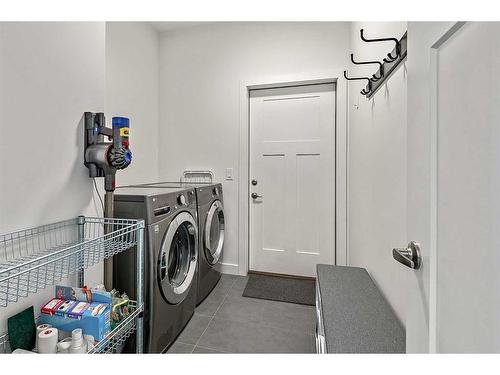 195 Riverwood Crescent, Diamond Valley, AB - Indoor Photo Showing Laundry Room
