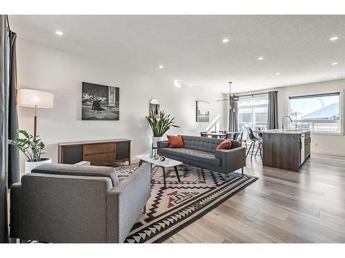 195 Riverwood Crescent, Diamond Valley, AB - Indoor Photo Showing Living Room