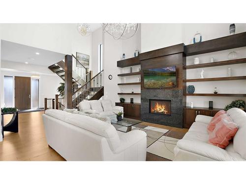 174 Aspen Summit Circle Sw, Calgary, AB - Indoor Photo Showing Living Room With Fireplace