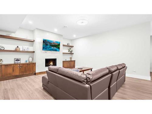 174 Aspen Summit Circle Sw, Calgary, AB - Indoor With Fireplace