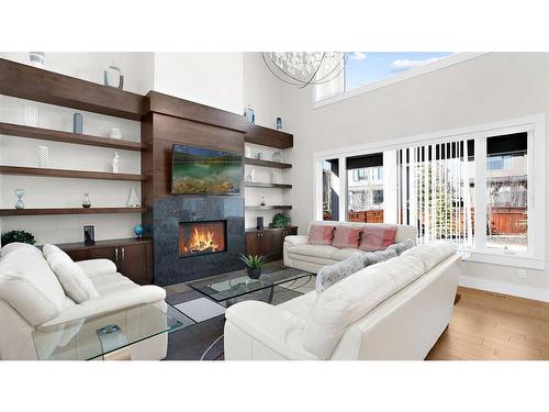 174 Aspen Summit Circle Sw, Calgary, AB - Indoor Photo Showing Living Room With Fireplace