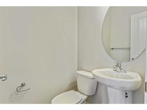 16 Emberside Heath, Cochrane, AB - Indoor Photo Showing Bathroom