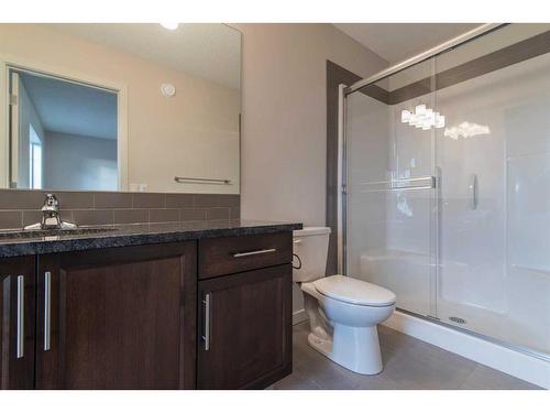 16 Emberside Heath, Cochrane, AB - Indoor Photo Showing Bathroom