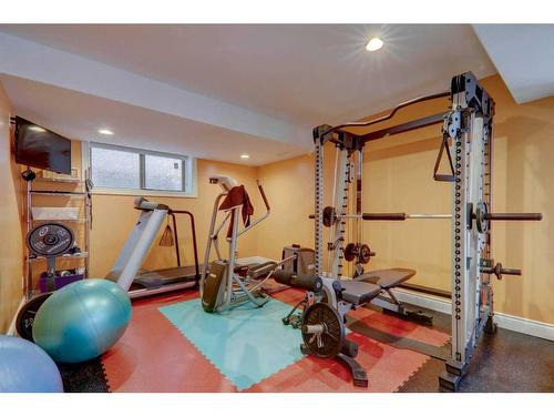 109 Shawnee Place Sw, Calgary, AB - Indoor Photo Showing Gym Room