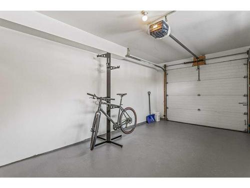 110-80 Dyrgas Gate, Canmore, AB - Indoor Photo Showing Garage