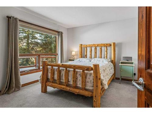 110-80 Dyrgas Gate, Canmore, AB - Indoor Photo Showing Bedroom