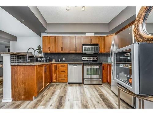 2211-1053 10 Street Sw, Calgary, AB - Indoor Photo Showing Kitchen With Stainless Steel Kitchen