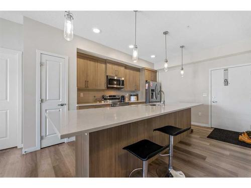 406-80 Carrington Plaza Nw, Calgary, AB - Indoor Photo Showing Kitchen With Upgraded Kitchen