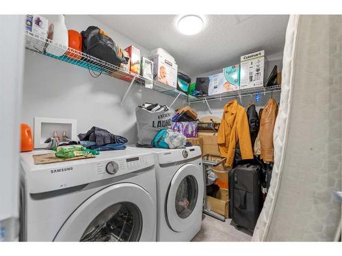 406-80 Carrington Plaza Nw, Calgary, AB - Indoor Photo Showing Laundry Room