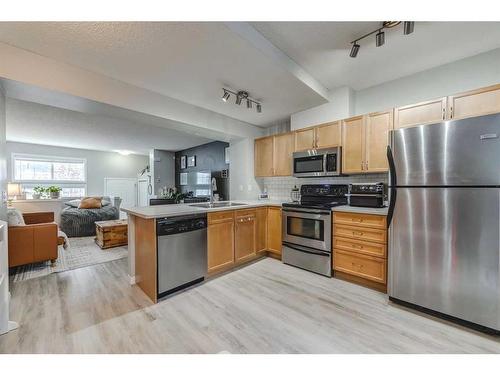 3150 New Brighton Gardens Se, Calgary, AB - Indoor Photo Showing Kitchen With Stainless Steel Kitchen