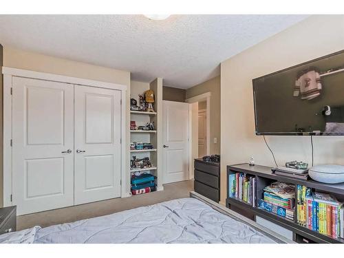 128 Mike Ralph Way Sw, Calgary, AB - Indoor Photo Showing Other Room