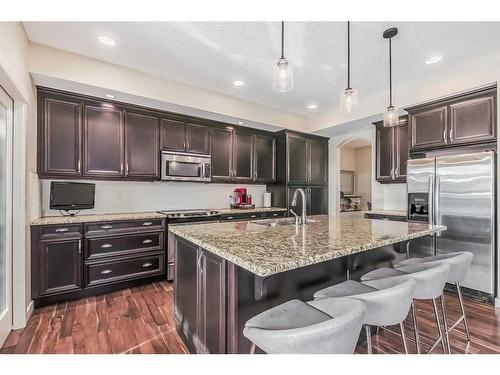 128 Mike Ralph Way Sw, Calgary, AB - Indoor Photo Showing Kitchen With Stainless Steel Kitchen With Upgraded Kitchen