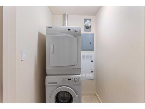 1503-8880 Horton Road Sw, Calgary, AB - Indoor Photo Showing Laundry Room