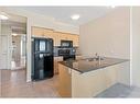 1503-8880 Horton Road Sw, Calgary, AB  - Indoor Photo Showing Kitchen With Double Sink 