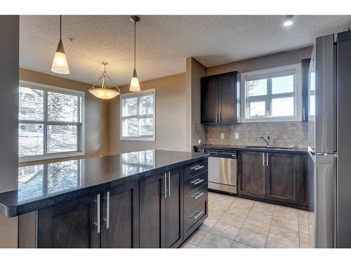 106-88 Arbour Lake Road Nw, Calgary, AB - Indoor Photo Showing Kitchen With Upgraded Kitchen