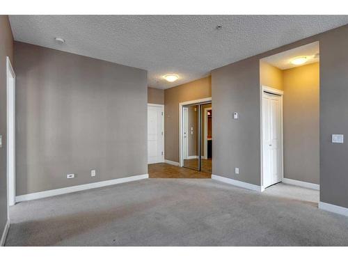 106-88 Arbour Lake Road Nw, Calgary, AB - Indoor Photo Showing Other Room