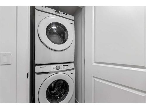 180 Nolancrest Circle Nw, Calgary, AB - Indoor Photo Showing Laundry Room