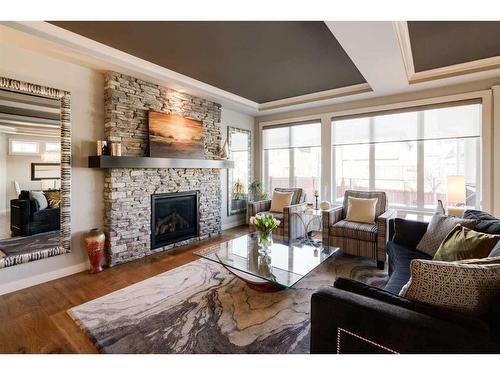 361 Auburn Shores Landing Se, Calgary, AB - Indoor Photo Showing Living Room With Fireplace