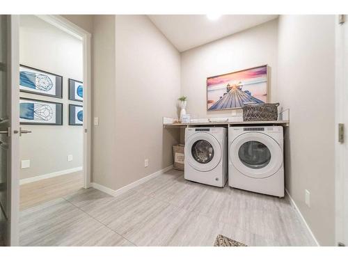 12 Cranbrook Mews Se, Calgary, AB - Indoor Photo Showing Laundry Room