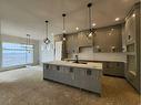 303 Muirfield Crescent, Lyalta, AB  - Indoor Photo Showing Kitchen With Upgraded Kitchen 