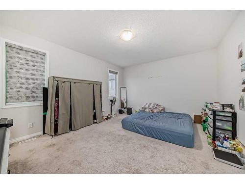 64 Cityside Common Ne, Calgary, AB - Indoor Photo Showing Bedroom