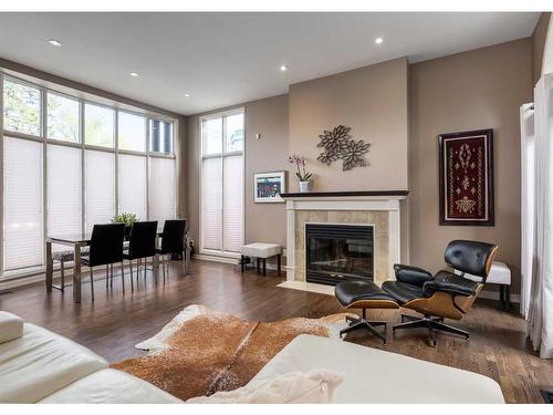 111 16 Street Nw, Calgary, AB - Indoor Photo Showing Living Room With Fireplace