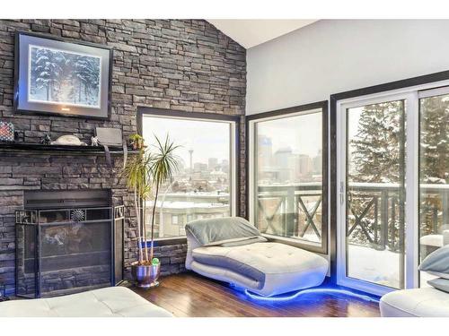 618 10 Street Ne, Calgary, AB - Indoor Photo Showing Other Room With Fireplace