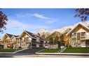 F207-950 Harvie Heights Road, Harvie Heights, AB  - Outdoor With Facade 