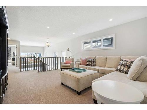 323 Chelsea Passage Ne, Chestermere, AB - Indoor Photo Showing Living Room