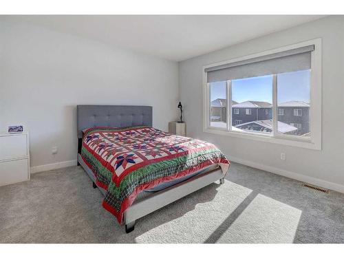 224 Chelsea Manor, Chestermere, AB - Indoor Photo Showing Bedroom