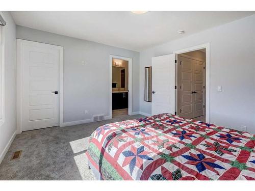 224 Chelsea Manor, Chestermere, AB - Indoor Photo Showing Bedroom