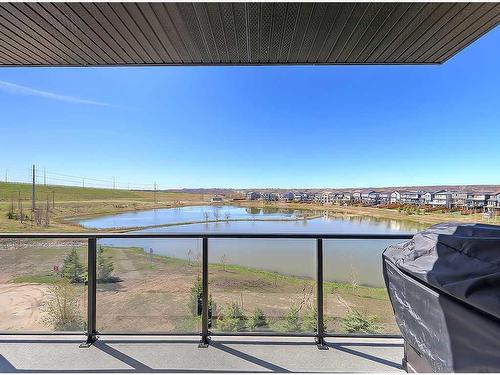 2208-42 Cranbrook Gardens Se, Calgary, AB - Outdoor With Body Of Water With Balcony With View