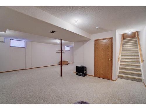 216 48 Avenue West, Claresholm, AB - Indoor Photo Showing Laundry Room