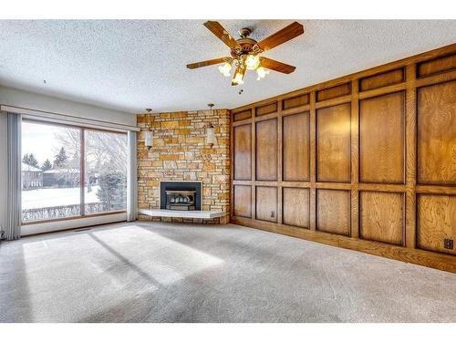 1211 Varsity Estates Drive Nw, Calgary, AB - Indoor Photo Showing Living Room With Fireplace