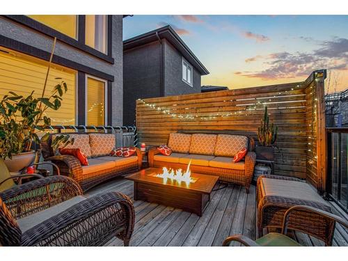 129 Springbluff Boulevard Sw, Calgary, AB - Outdoor With Deck Patio Veranda With Exterior